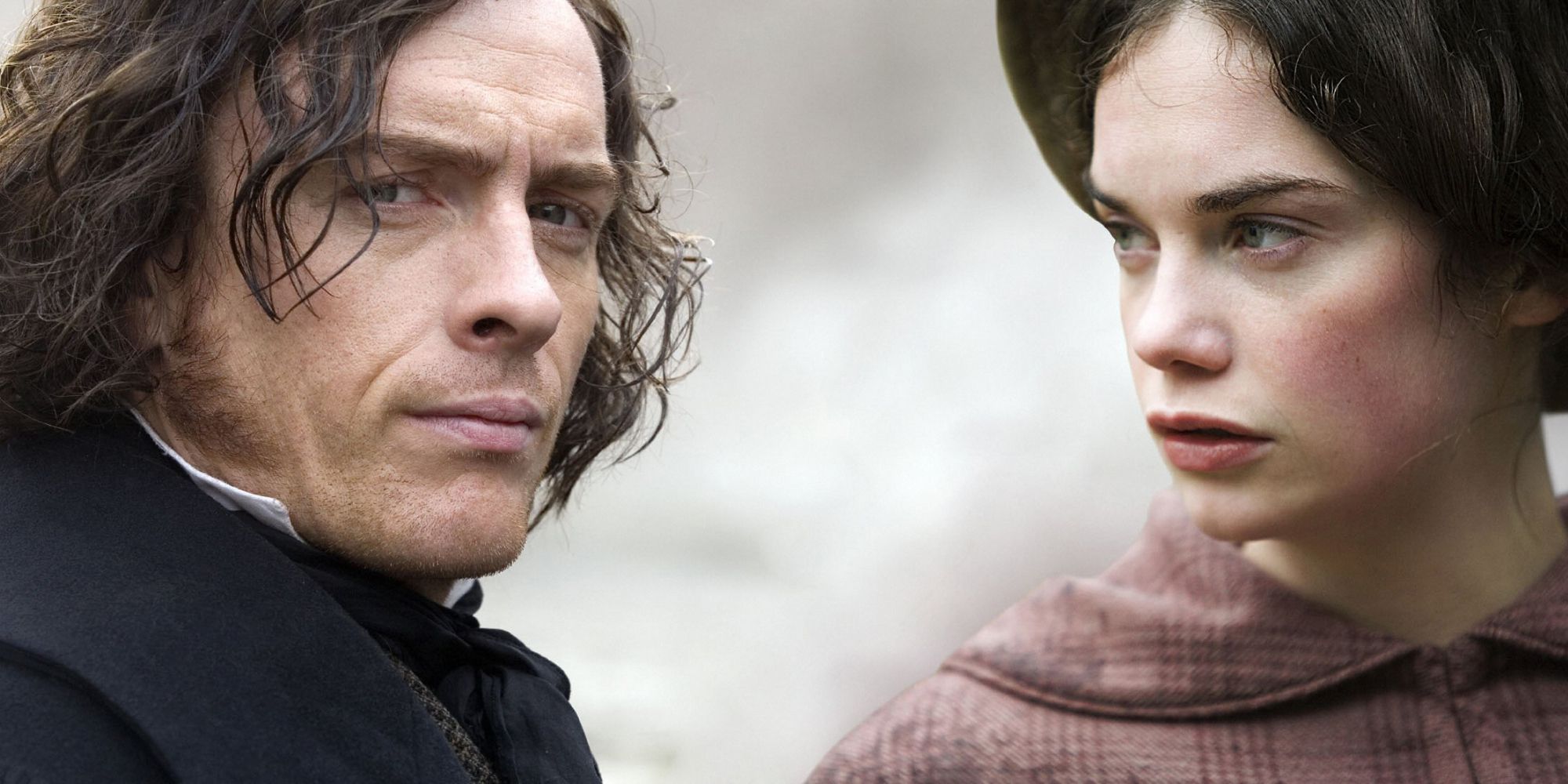 A combined promotional image of Jane Eyre with a close up of Toby Stephens' Rochester on the left and Ruth Wilson's Jane Eyre on the right
