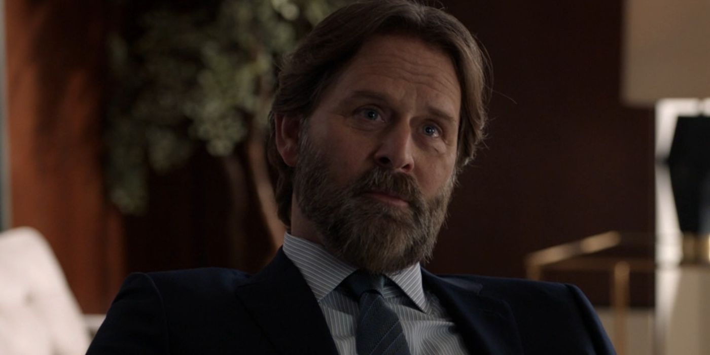 Jeffrey Nordling as Eric Kaldor seated looking up in the legal drama 'Suits'