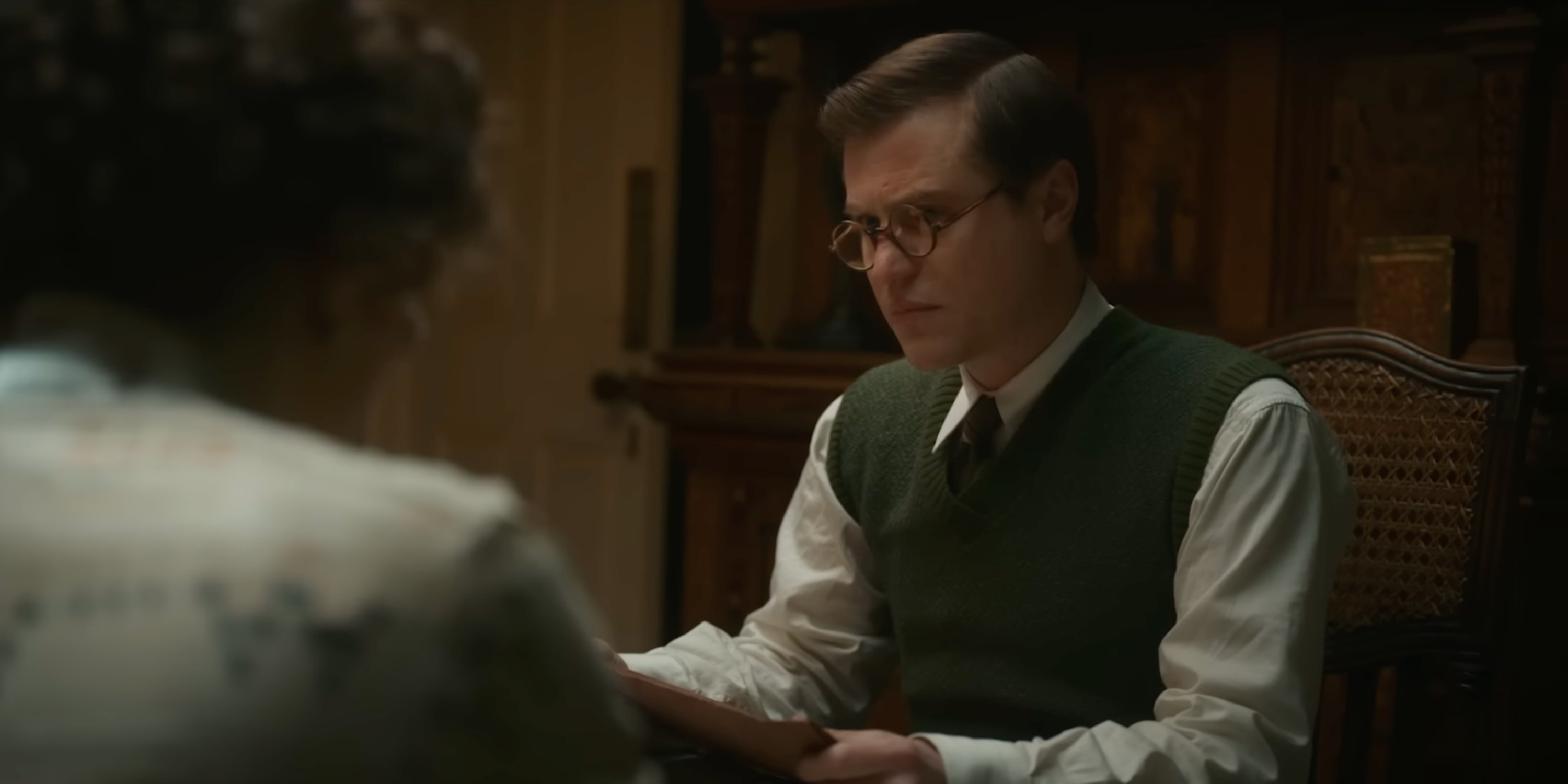 Johnny Flynn portrays young Nicholas Winton sitting in chair