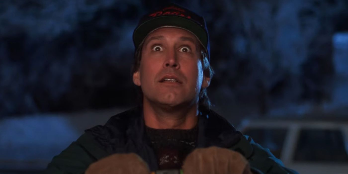 Clark Griswold (Chevy Chase) plugging in Christmas lights in National Lampoon's Christmas Vacation