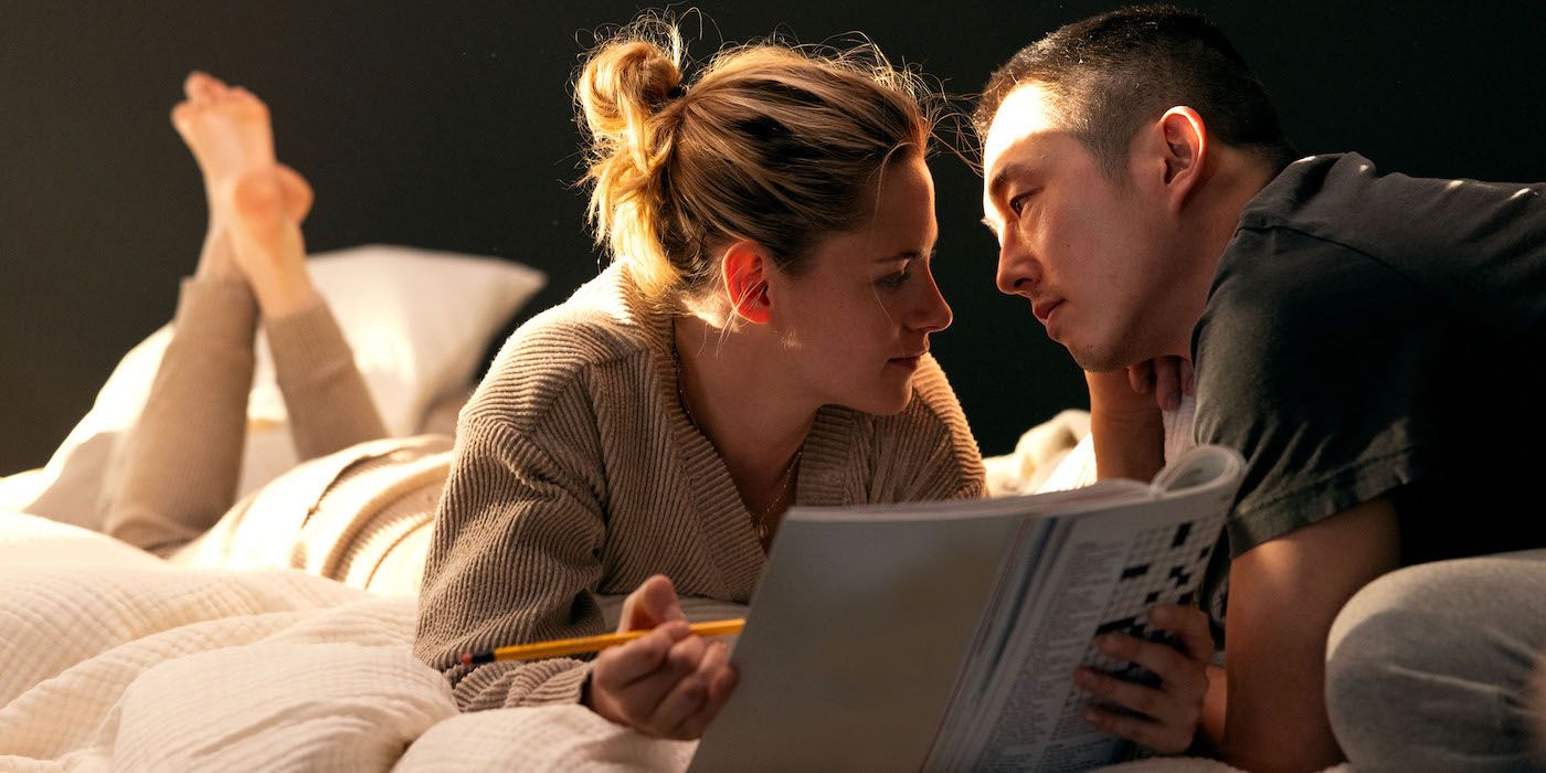 Kristen Stewart (left) and Steven Yeun (right) share an itimate moment together in Love Me. 
