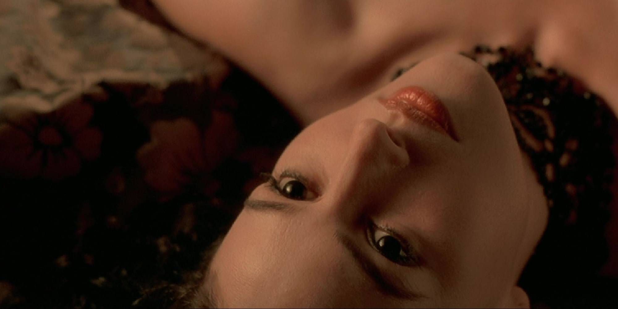 A close-up shot of Monica Bellucci lying down in Brotherhood of the Wolf.