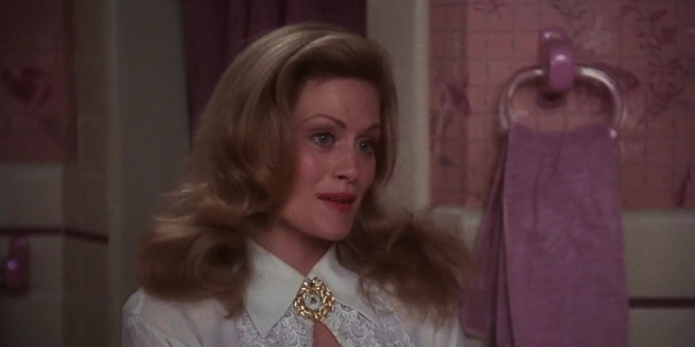 Beverly D'Angelo as Ellen Griswold standing in the bathroom in National Lampoon's Christmas Vacation