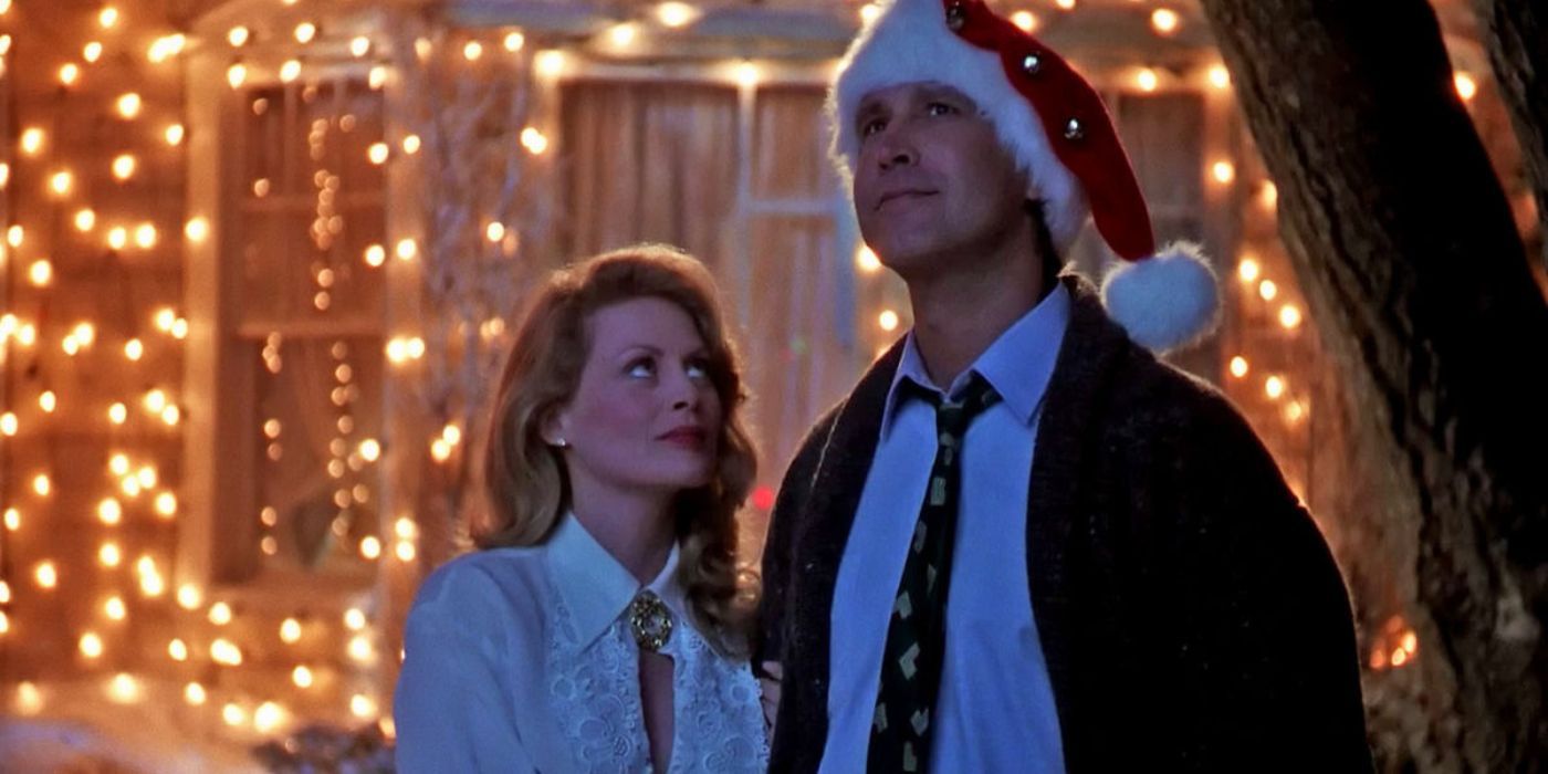 Clark (Chevy Chase) and Ellen (Beverly D'Angelo) Griswold, standing outside their house in National Lampoon's Christmas Vacation