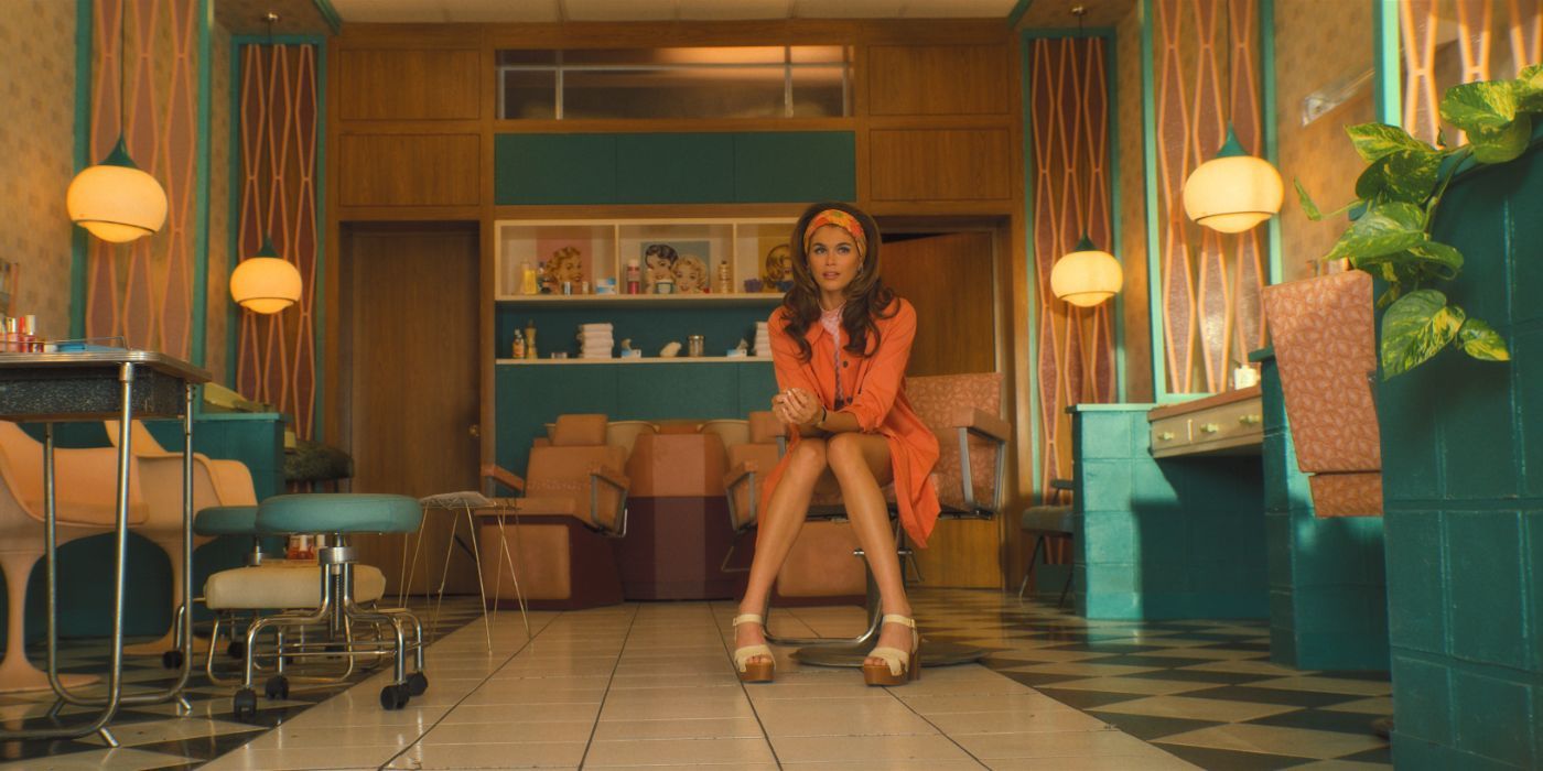 Kaia Gerber sits in a hair salon in 'Palm Royale'