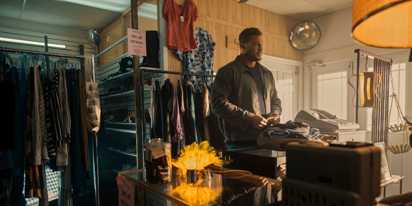 Jack Reacher (Alan Ritchson) visiting a thrift shop in Reacher Season 2