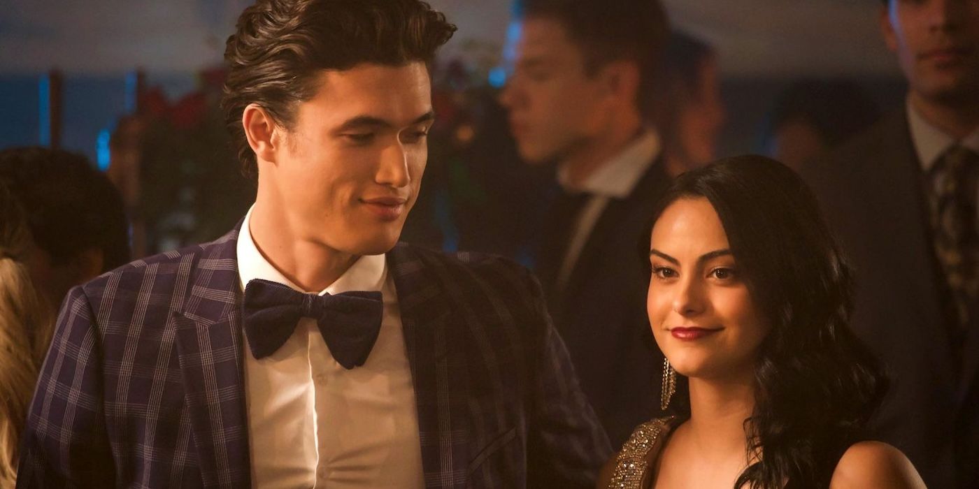 Reggie (Charles Melton) staring longingly at Veronica (Camila Mendes) in Riverdale