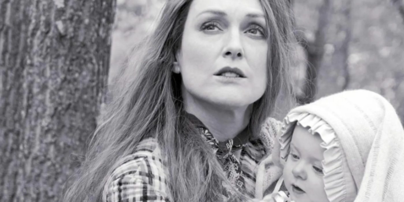 Lillian Mayhew holding a baby in Wonderstruck