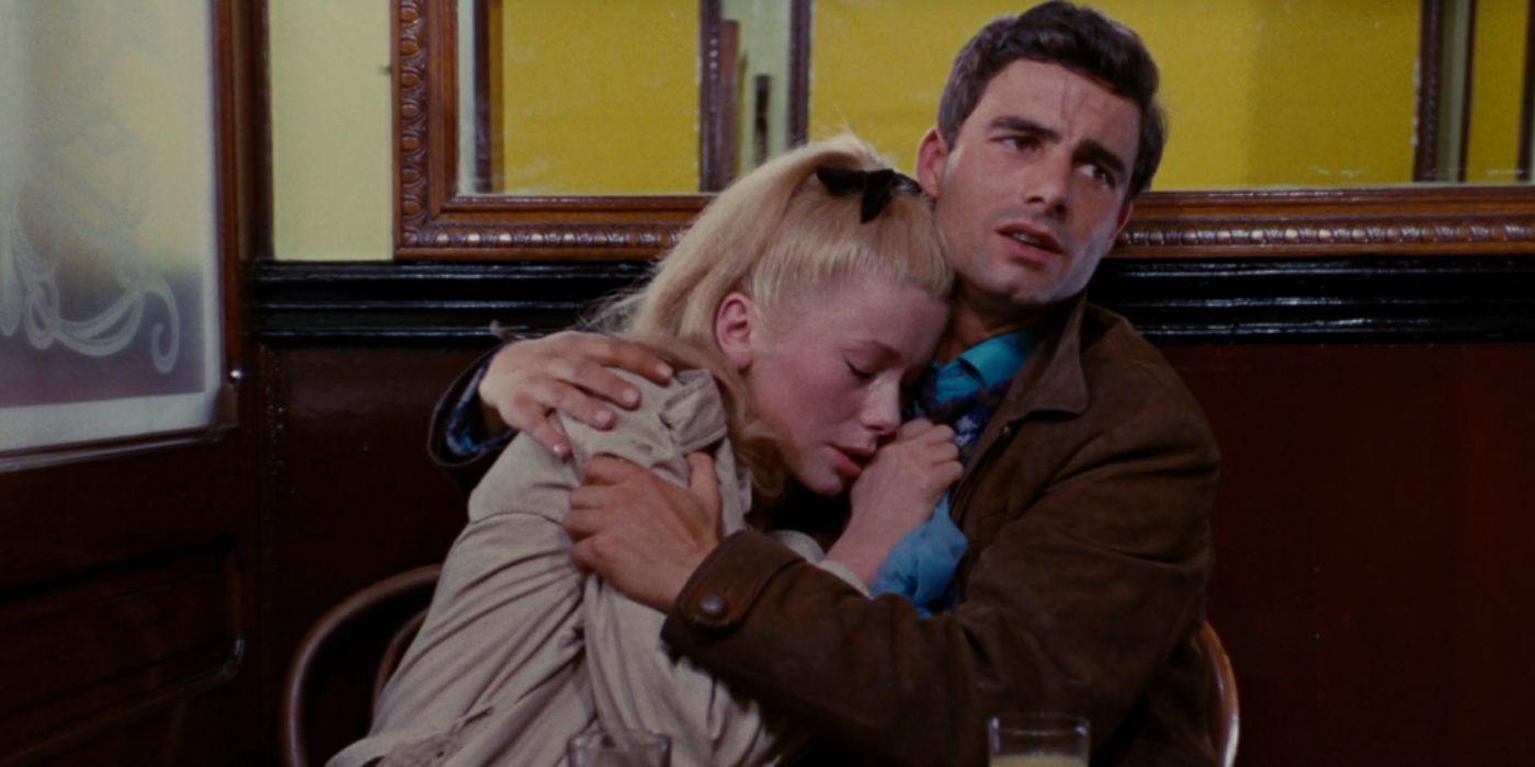 Catherine Denueve and Nino Castelnuovo cry in cafe in 'The Umbrellas of Cherbourg'