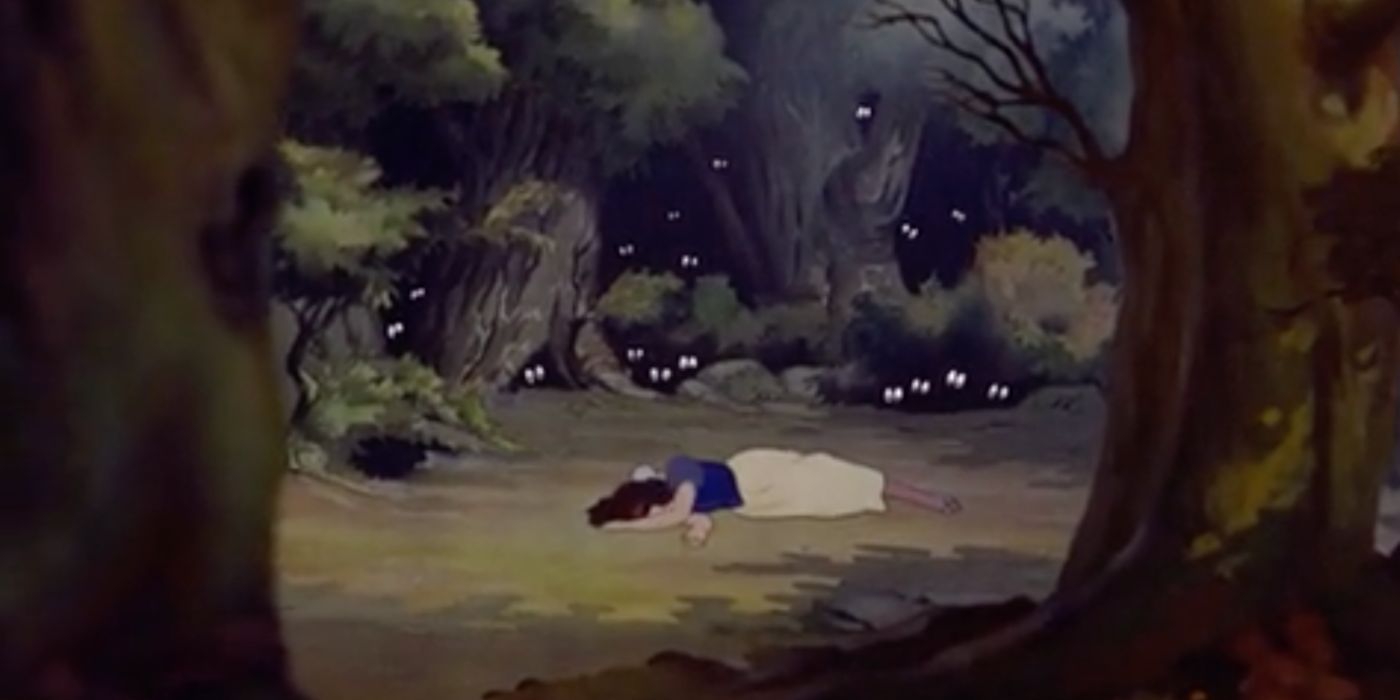 Snow White laying in the middle of the woods in Snow White and the Seven Dwarves