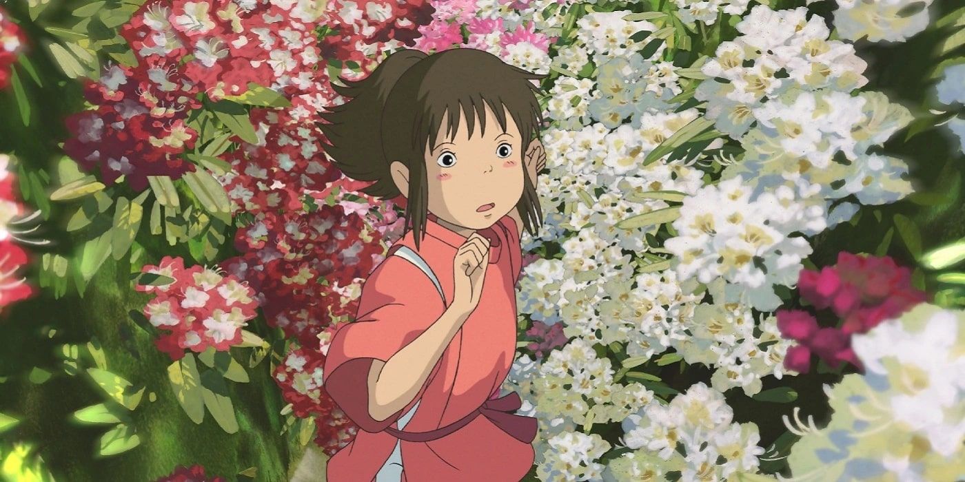 Chihiro standing among flowers in 'Spirited Away'