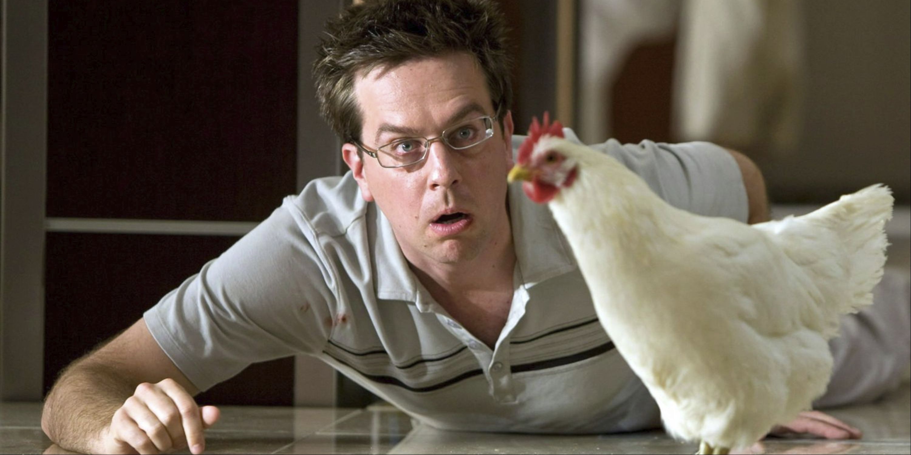 Ed Helms as Stu staring at a chicken in The Hangover