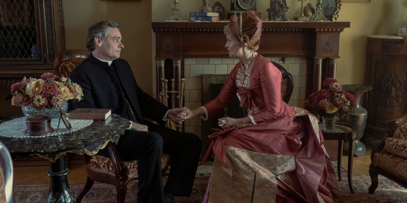 Cynthia Nixon and Robert Sean Leonard sitting while holding hands in The Gilded Age Season 2.