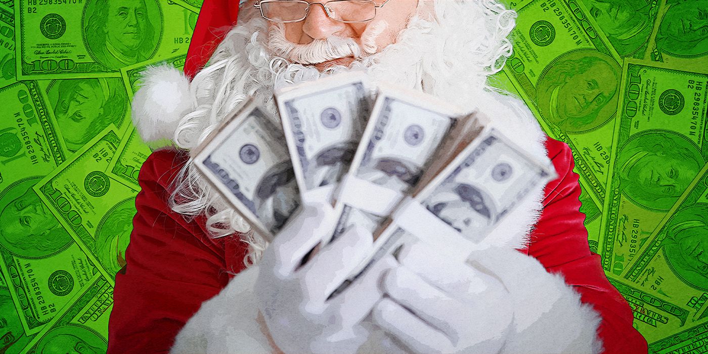Santa Clause holding stacks of money with a green money background