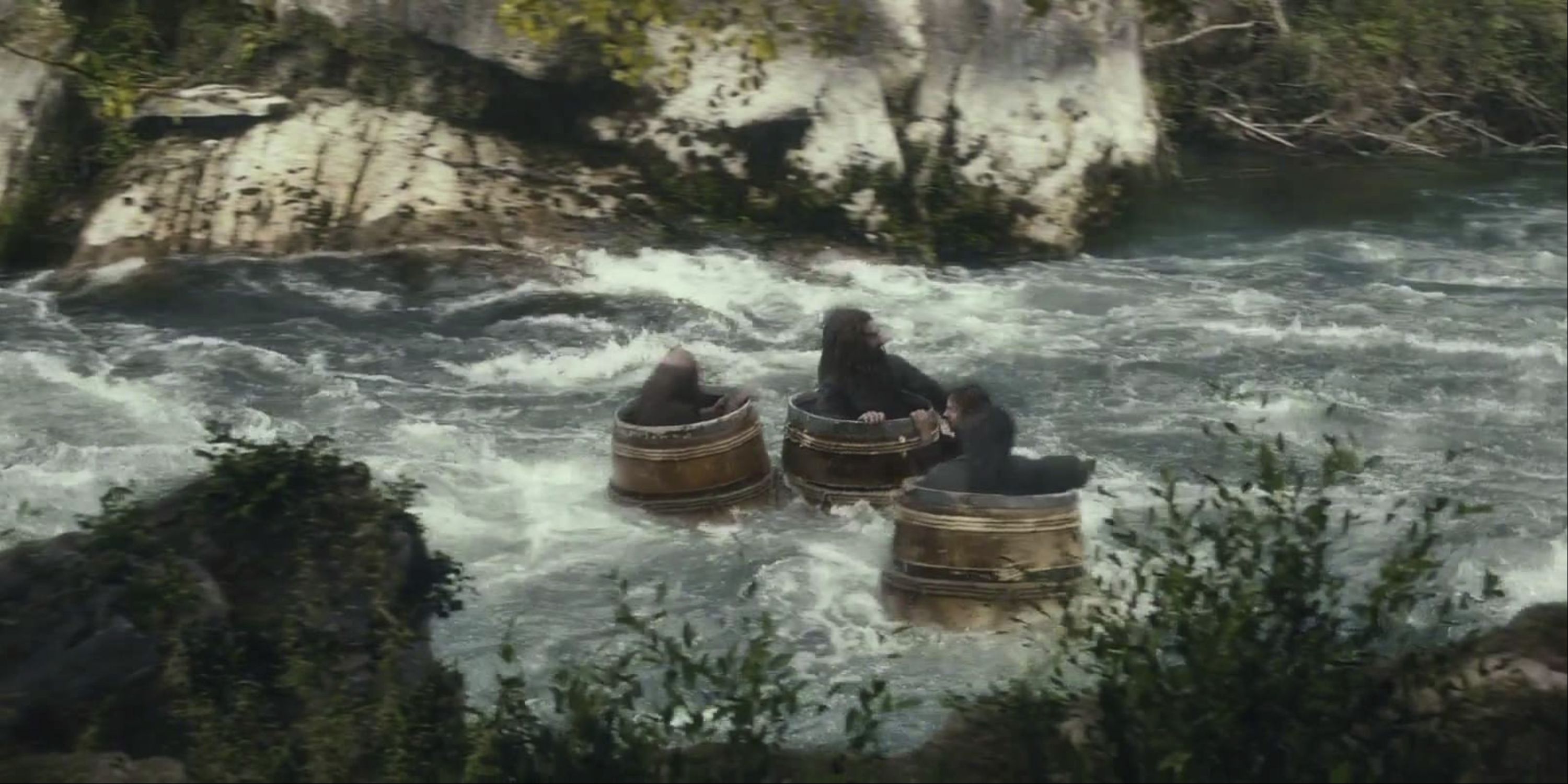 The Dwarves riding down river in barrels in The Hobbit