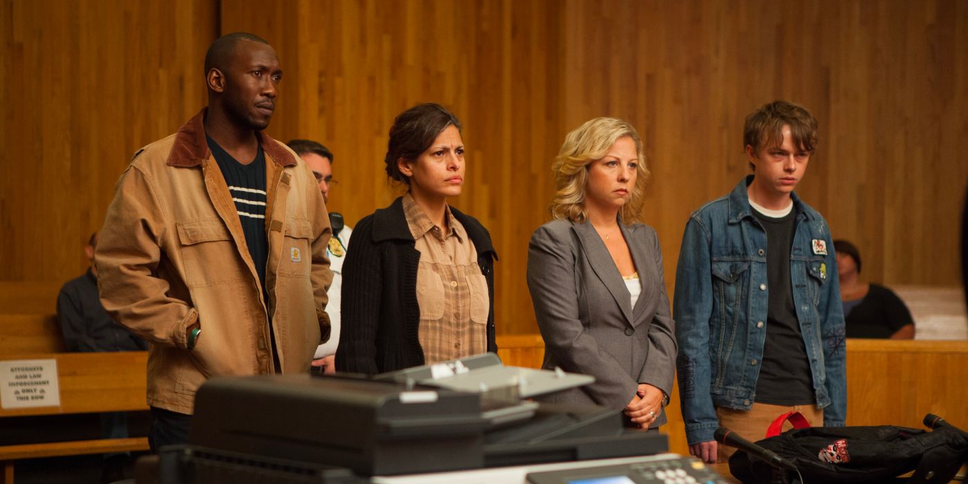  Kofi, Romina, and Jason stand with their legal advisor in court in The Place Beyond the Pines.