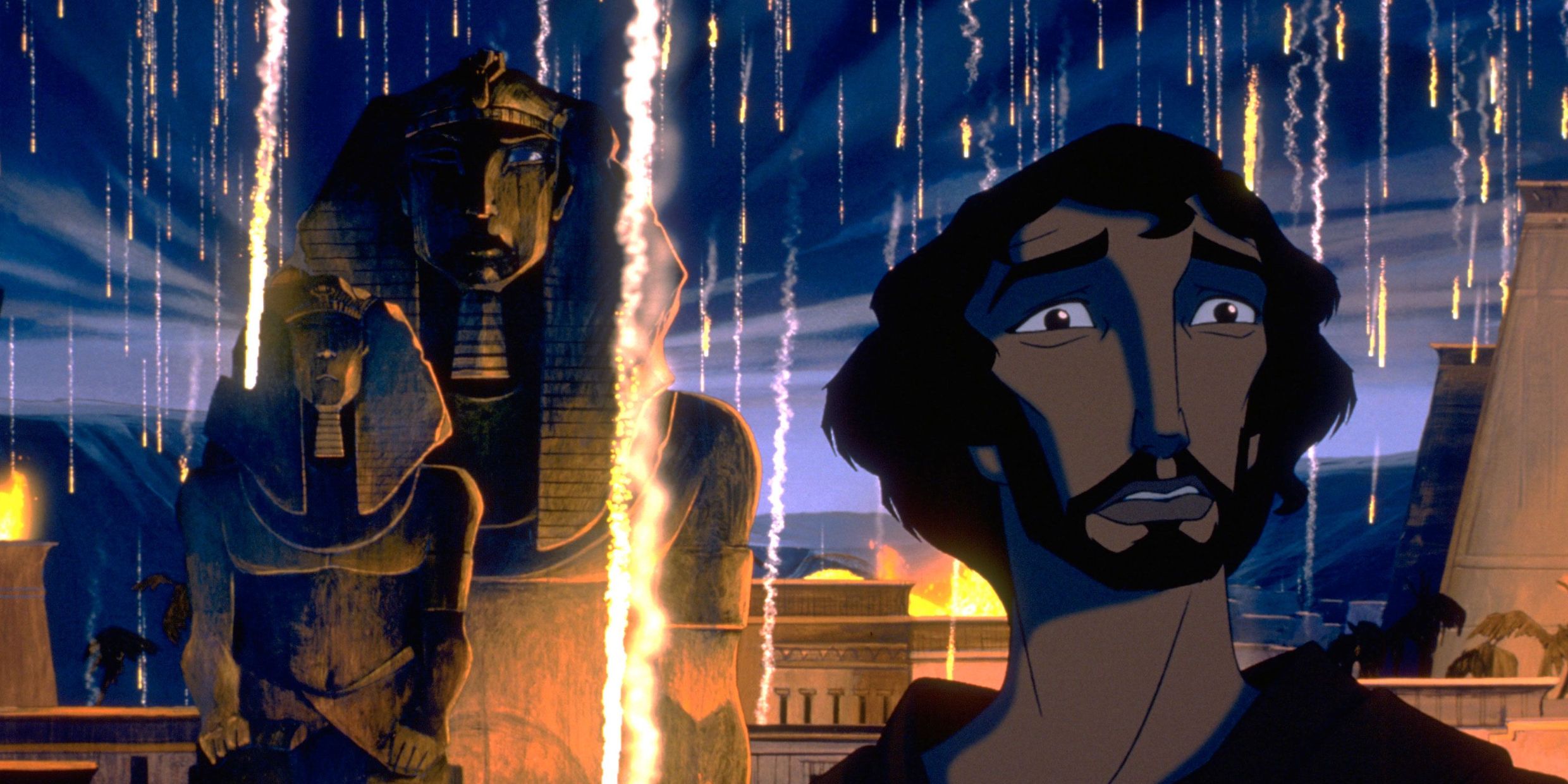 A concerned Moses, voiced by Val Kilmer, staring ahead with the Egyptian pyramids and fire raining down from the sky behind him in The Prince of Egypt