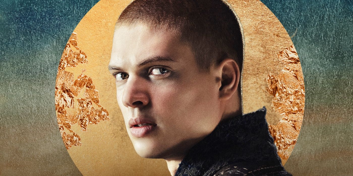 Josha Stradowski as Rand in front of The Wheel of Time S2 poster backdrop