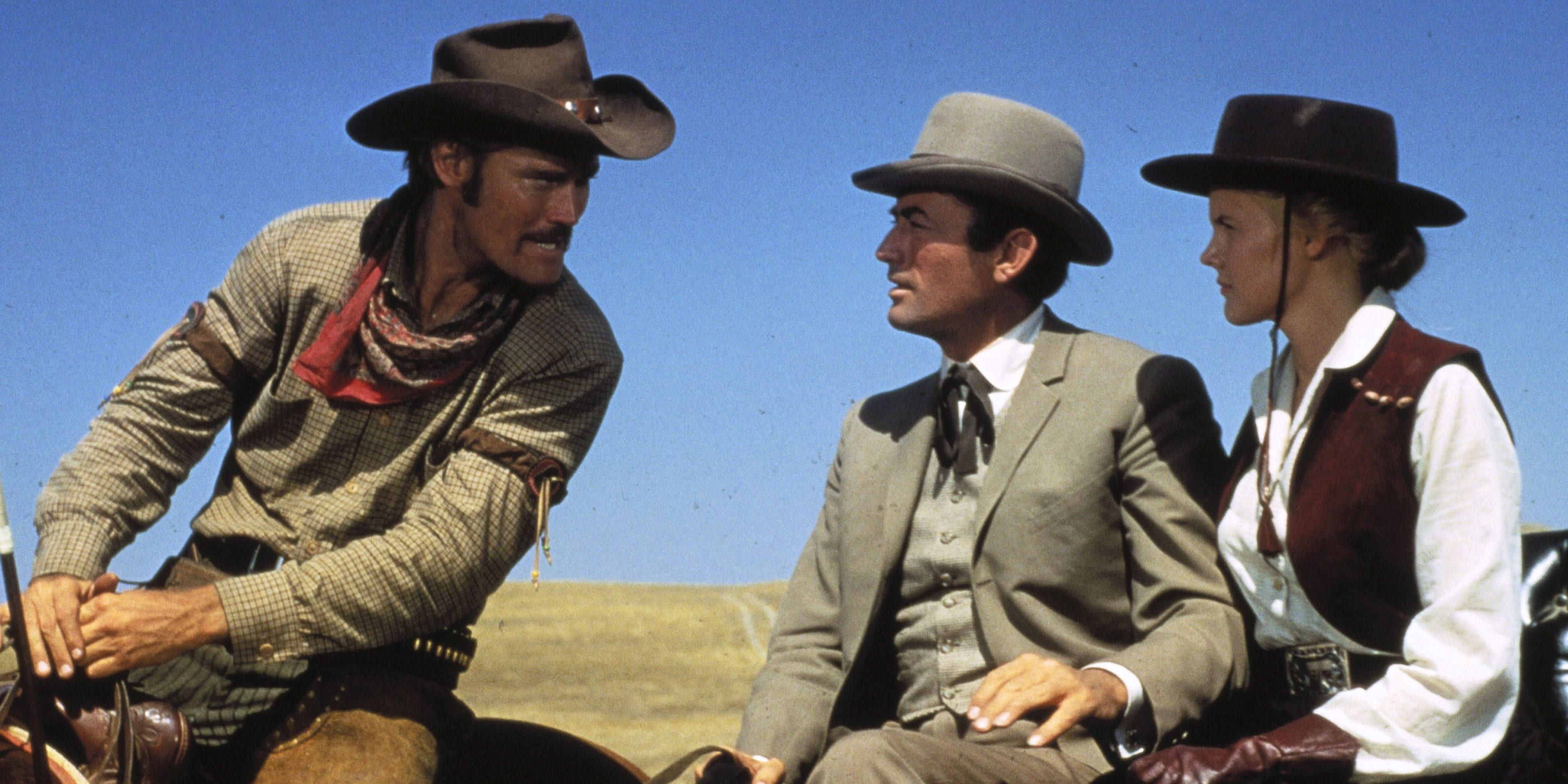 Chuck Connors riding with Gregory Peck and Carroll Baker in The Big Country