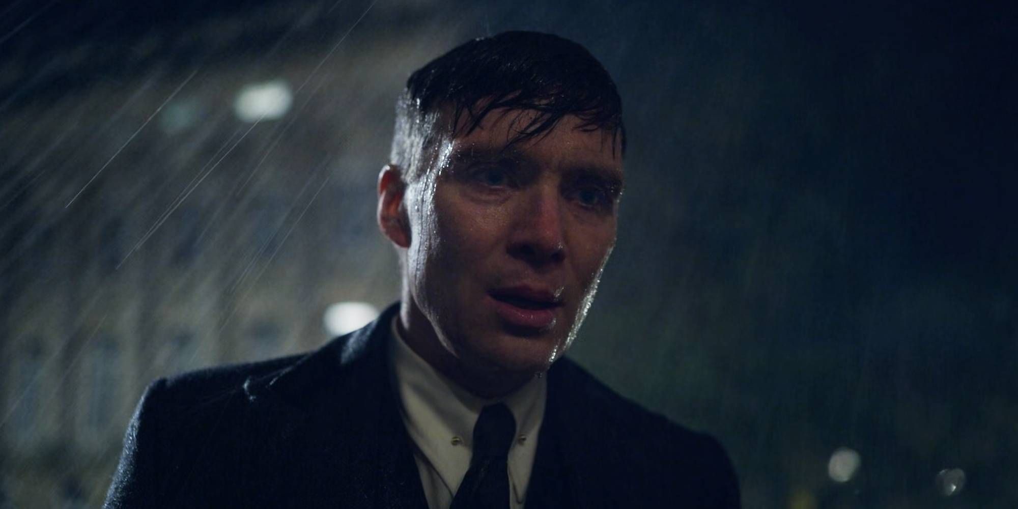Tommy Shelby standing under the rain in Season 6