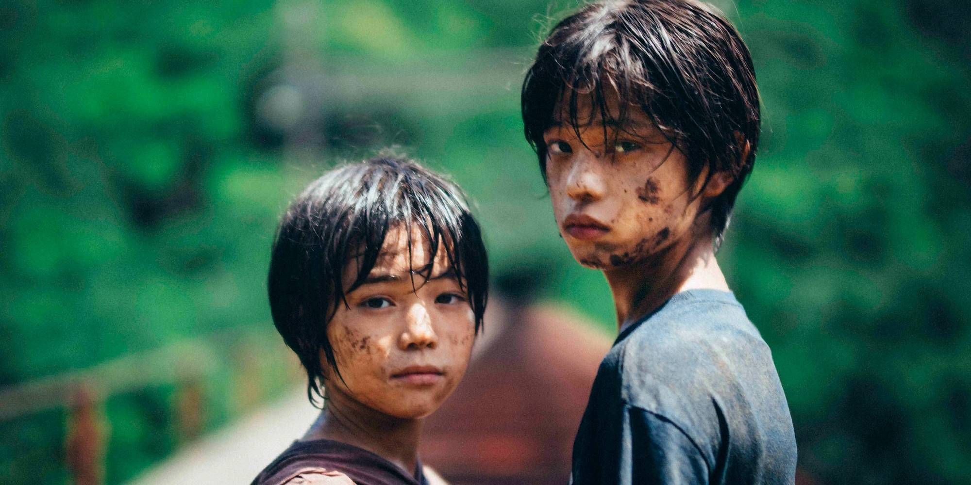 Two boys in Monster looking at the camera.