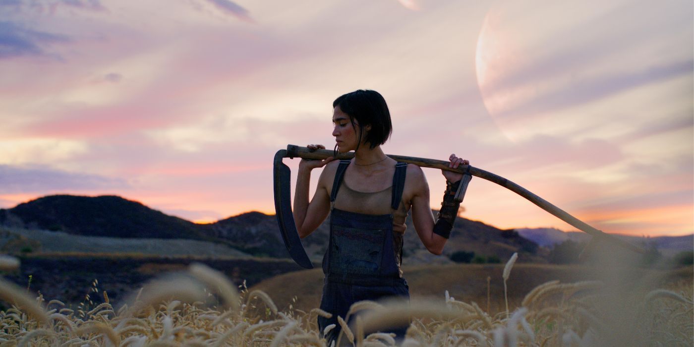 Sofia Boutella standing in a wheat field in Rebel Moon part one