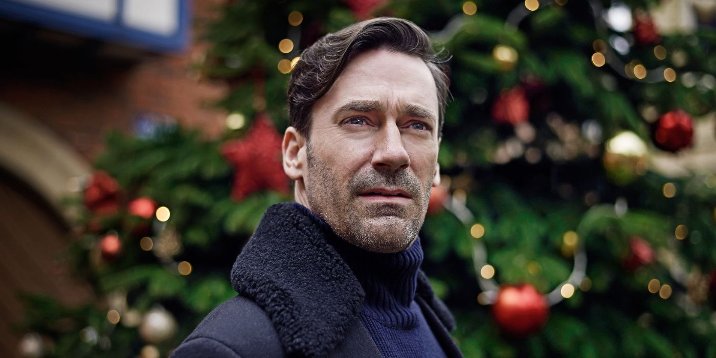 Jon Hamm standing in front of a Christmas tree in the Black Mirror episode 