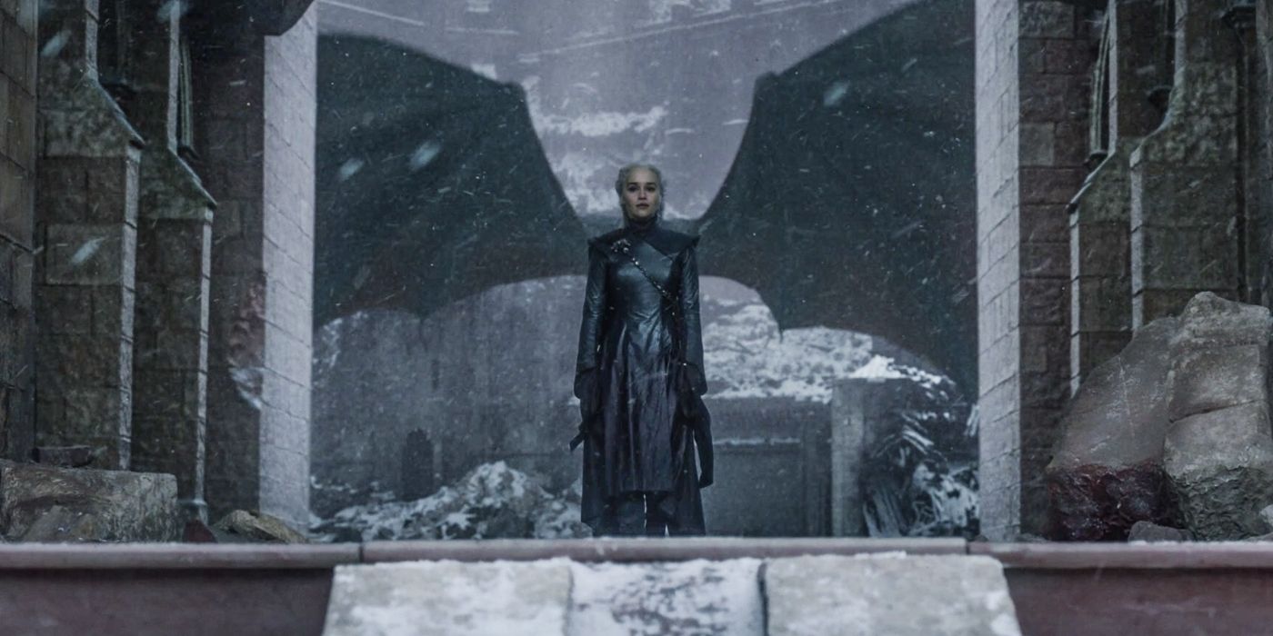 Daenerys Targaryen with her dragon's wings in the background in 'Game of Thrones'