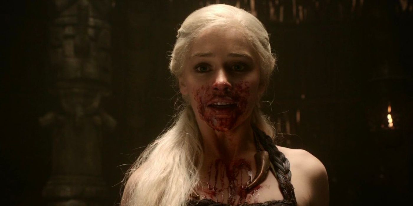 Daenerys Targaryen (Emilia Clarke) completes a pregnancy ritual in Vaes Dothrak, with blood smeared across her face.