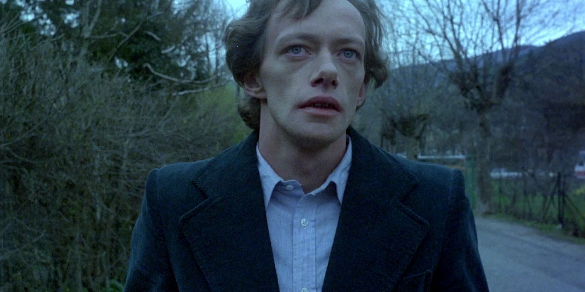 A young man walking down the street in the film Angst.