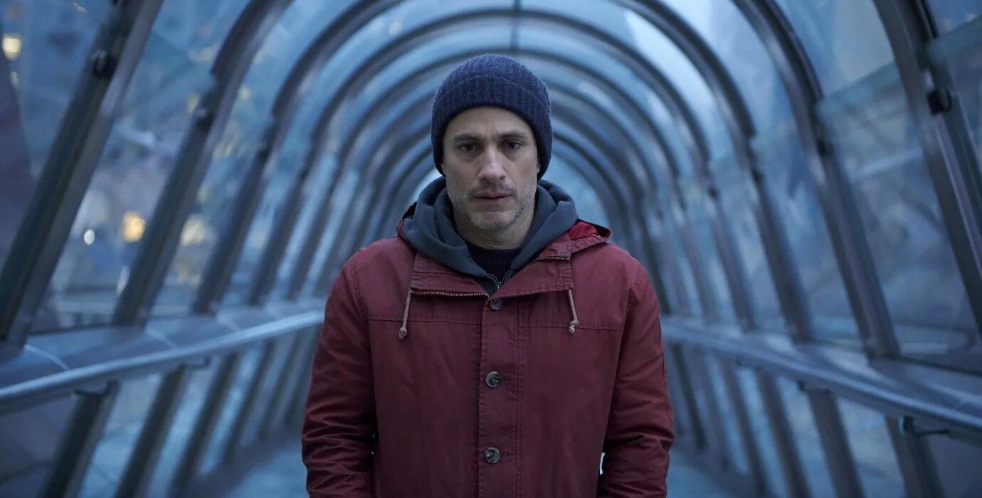 'Another End' image shows Gael García Bernal inside a glass tunnel looking sad.