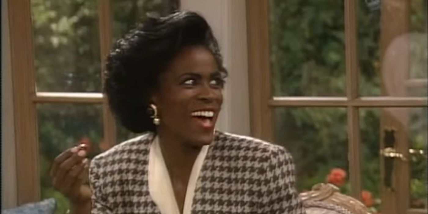 Aunt Viv (Janet Hubert) smiling in The Fresh Prince of Bel-Air.