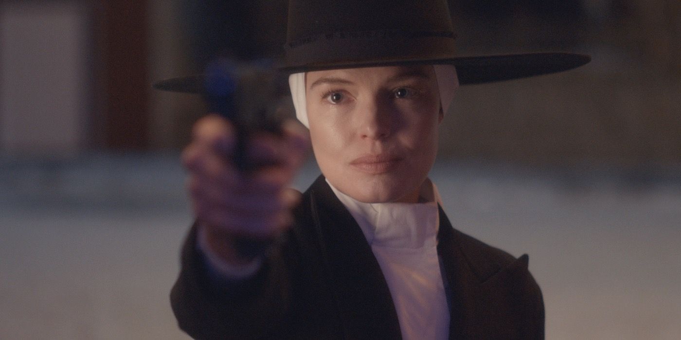 Kate Bosworth as The Woman pointing a gun in Bring on the Dancing Horses.