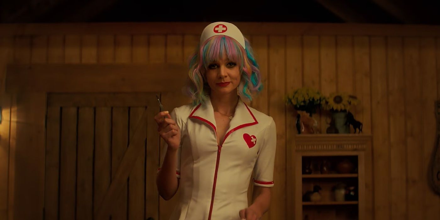 Cassie in Promising Young Woman holding a needly and wearing a nurse's uniform