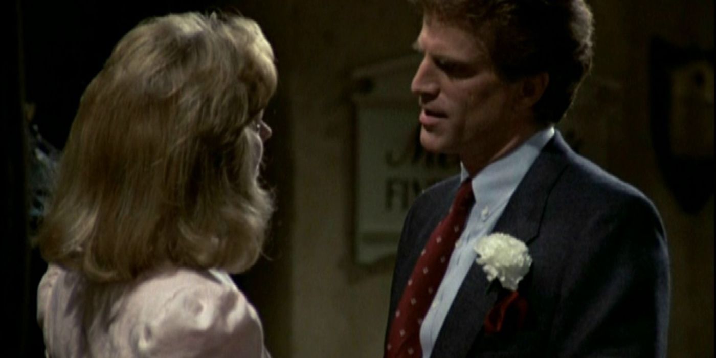 Ted Danson looking at a woman in Cheers