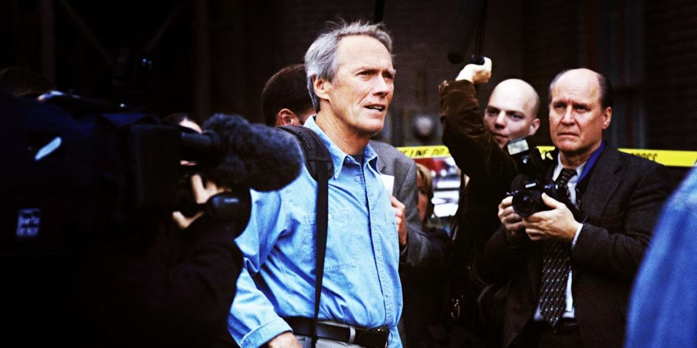 Clint Eastwood as Terry McCaleb, walking through a swarm of reporters in Blood Work