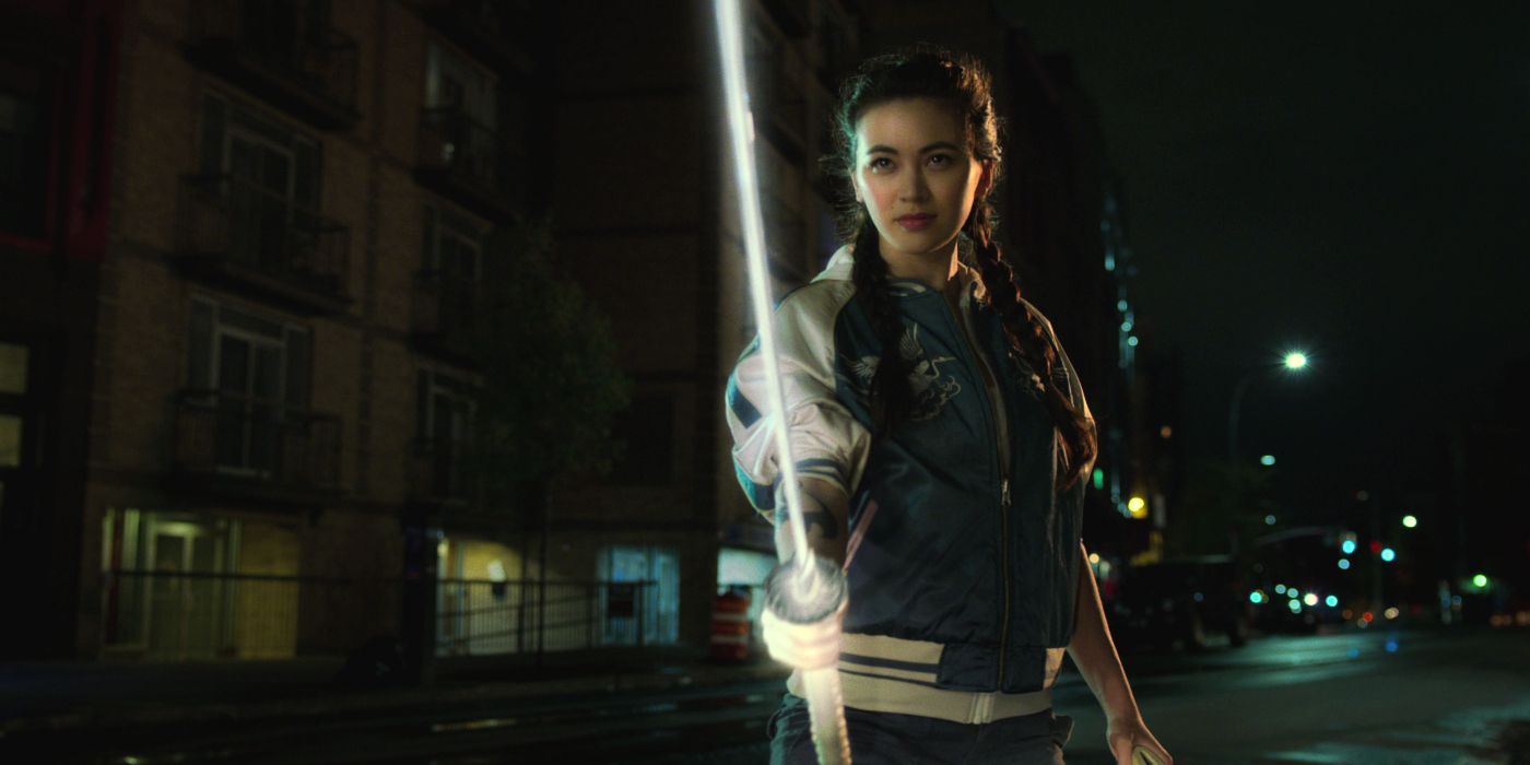 Jessica Henwick as Colleen Wing holding a glowing white sword in Iron Fist Season 2