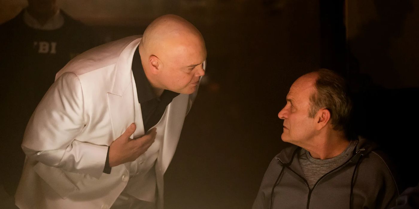 Wilson Fisk, played by Vincent D'Onofrio, leaning in menacingly toward another man in Daredevil