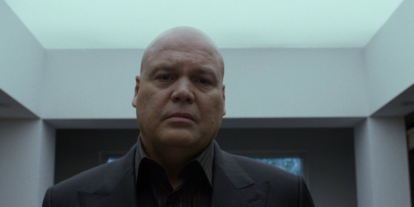 Wilson Fisk, played by Vincent D'Onofrio, staring ahead with a pensive and sad expression in Daredevil