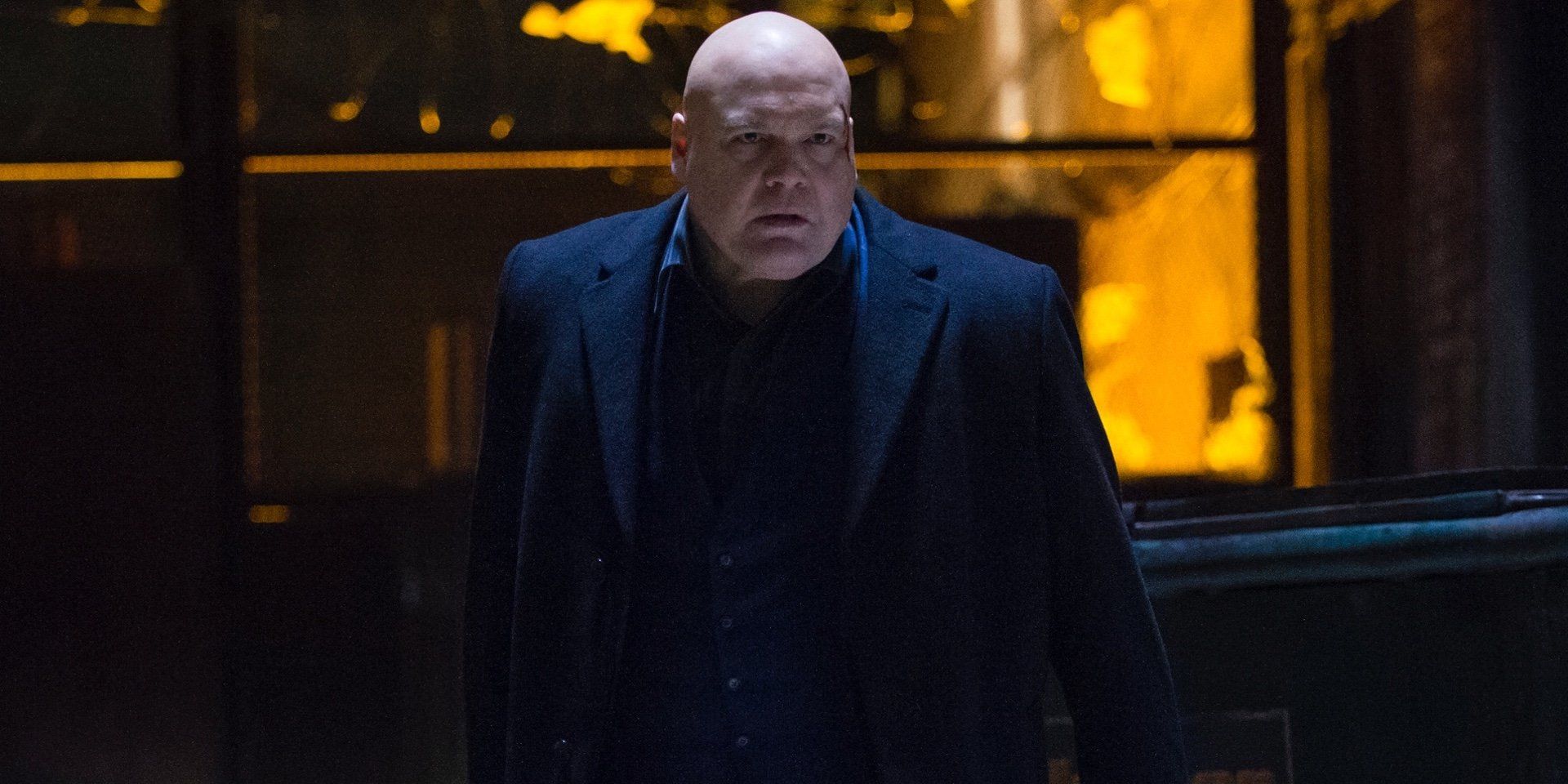 Wilson Fisk, played by Vincent D'Onofrio, staring ahead with an angry expression in Daredevil