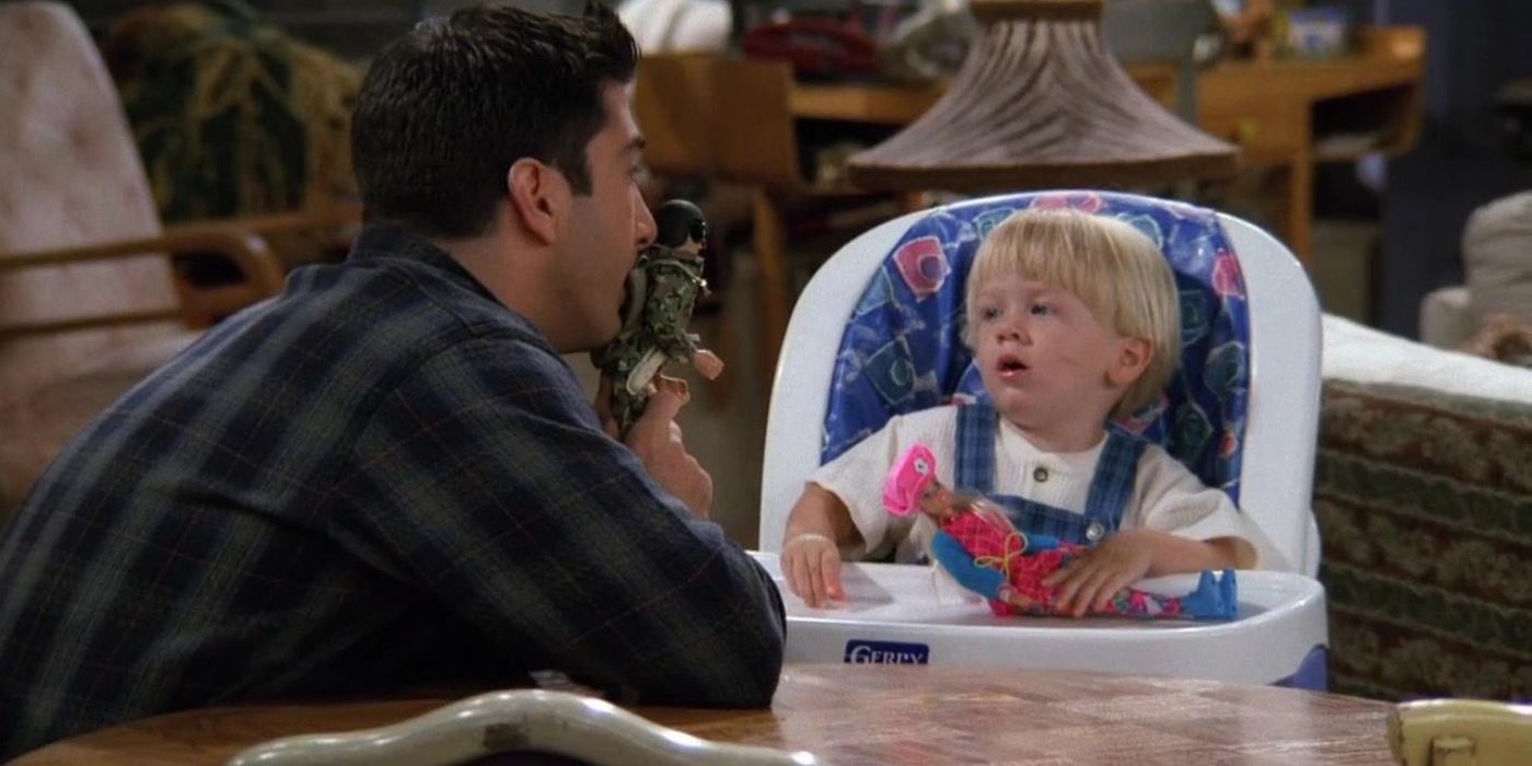 Ross showing a G.I. Joe to baby Ben in Friends