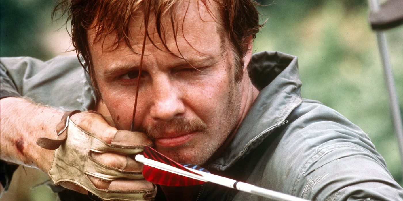 Ed Gentry (Jon Voight) atirando uma flecha em Deliverance (1972)