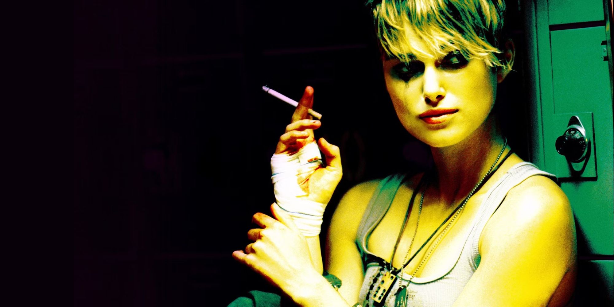 Keira Knightley smokes a cigarette during a police interrogation in Tony Scott's 'Domino'