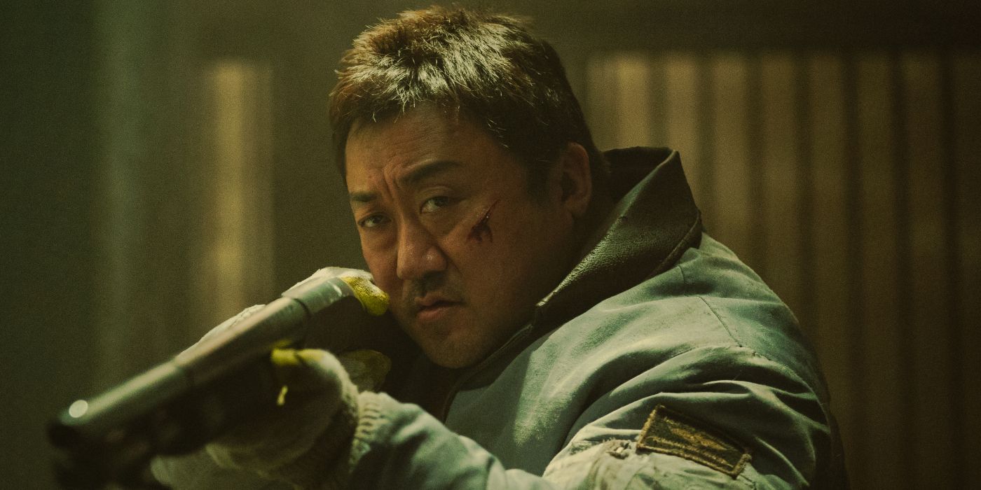 Don Lee as Nam San, holding a shotgun in Badland Hunters