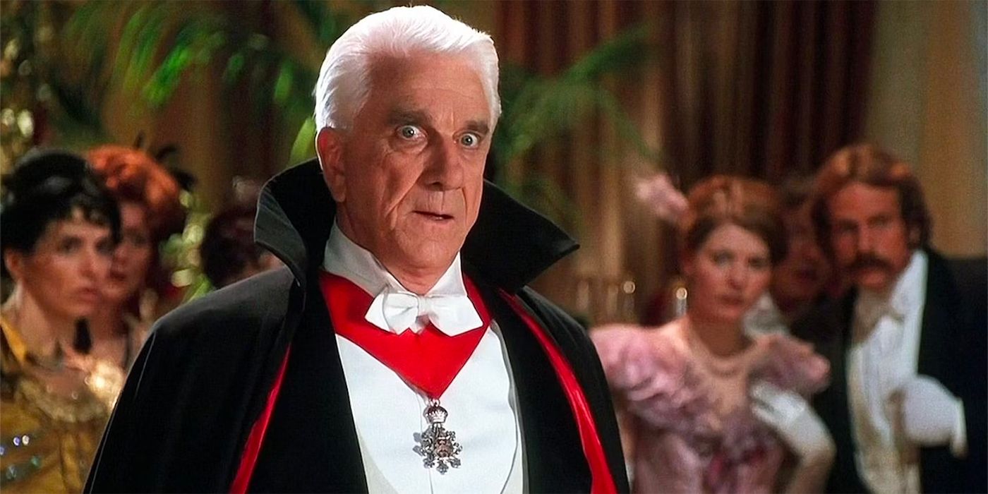 Leslie Nielsen as Dracula in a crowd at a party in Dracula: Dead and Loving It