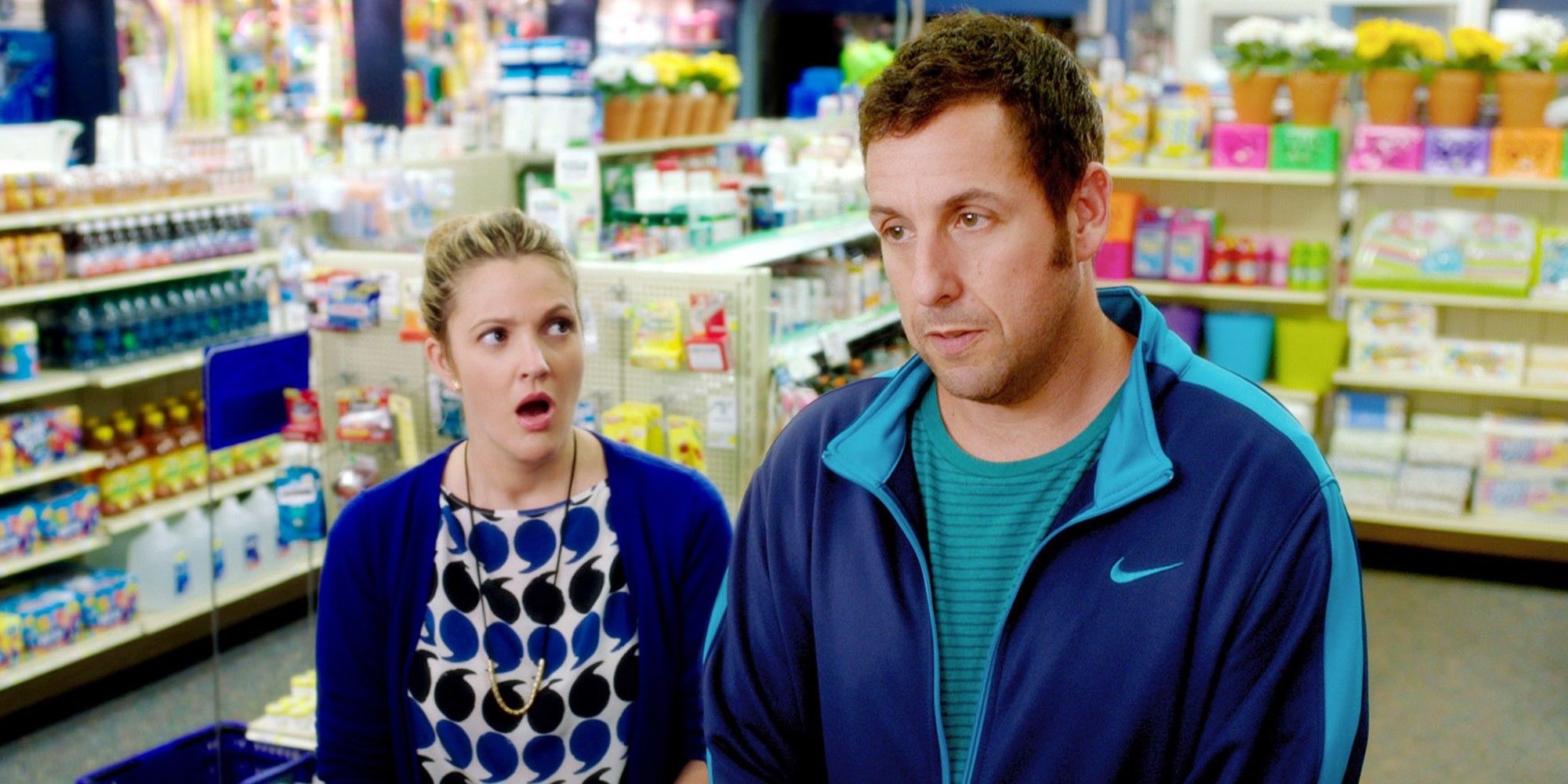 Drew Barrymore looks shocked at Adam Sandler in a drug store in Blended