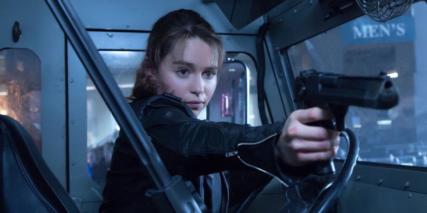 Emilia Clarke as Sarah Connor, holding a gun, in 'Terminator: Genisys.'