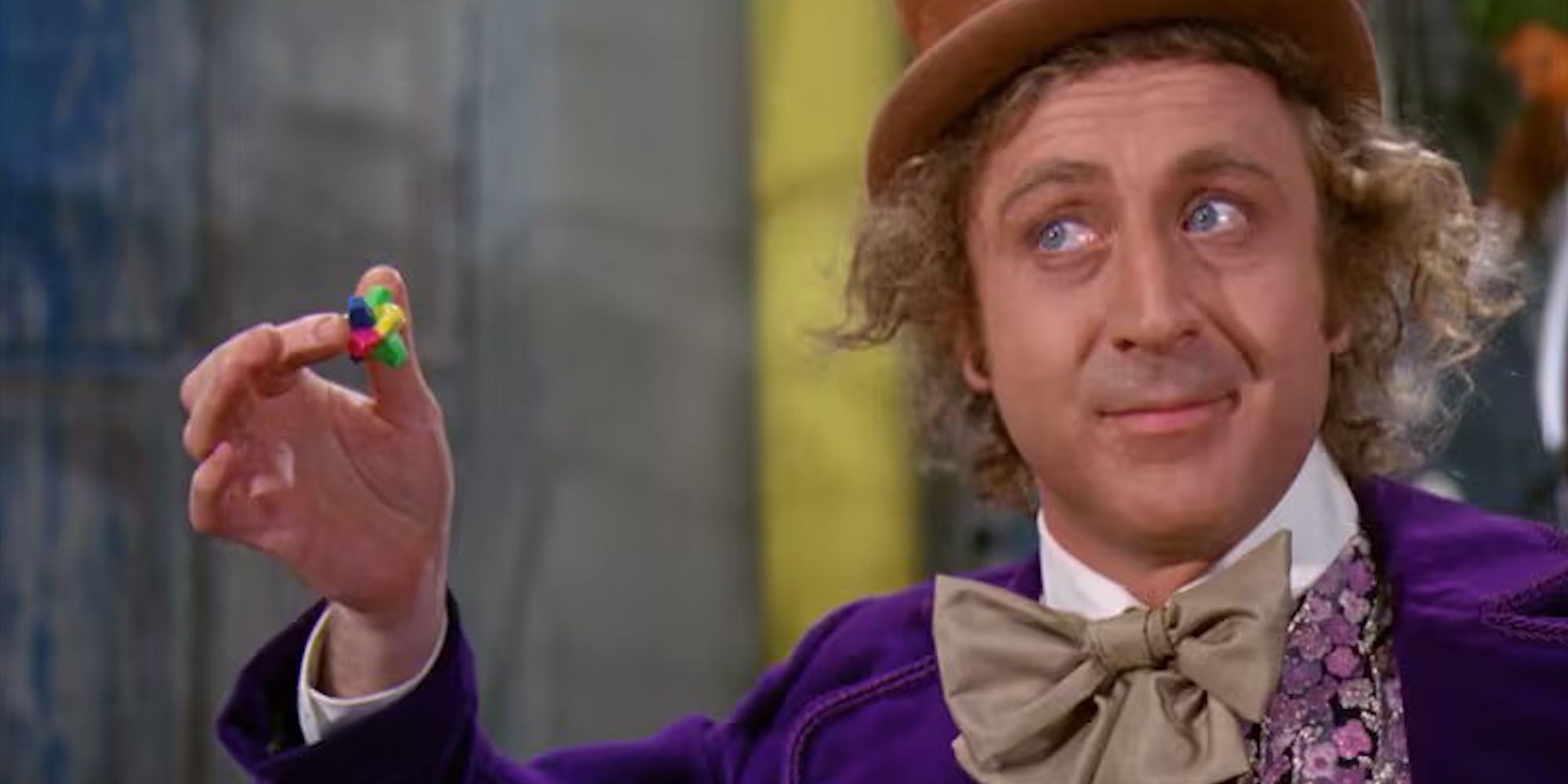 Willy Wonka holding an Everlasting Gobstopper candy in Willy Wonka and the Chocolate Factory0