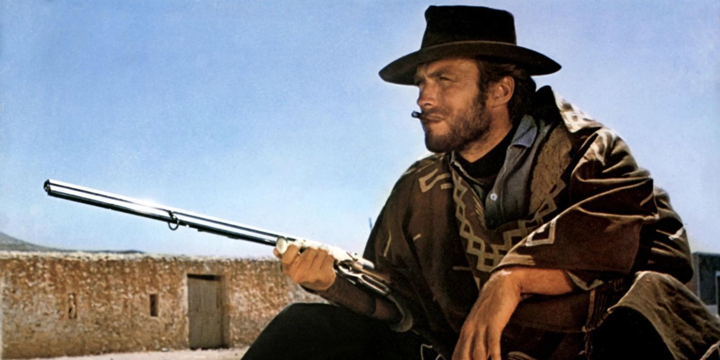Clint Eastwood as Manco a.k.a The Man With No Name holding out a shotgun in For A Few Dollars More