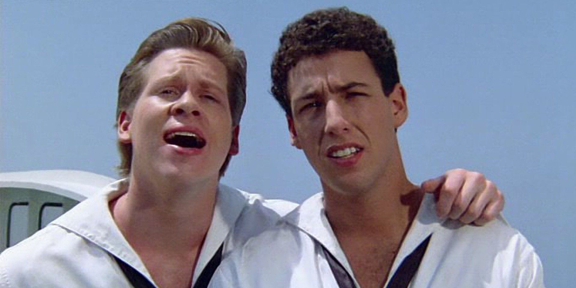 A still from the film Going Overboard featuring Adam Sandler and Tom Hodges in sailor outfits